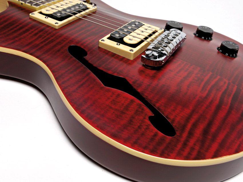 A stylish finish meets high quality features on this semi-acoustic.