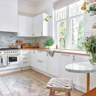 A white kitchen with gloss cupboards