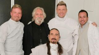 Black Sabbath bassist Geezer Butler and the Backstreet Boys in 2025