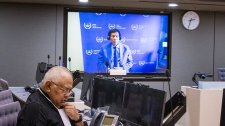 Former Philippine President Rodrigo Duterte appears in an ICC courtroom remotely on March 14, 2025.