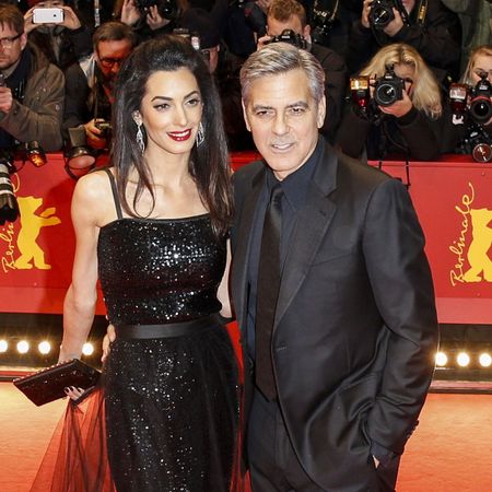 George & Amal Clooney dressed in black at a public event