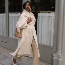 emmanuelle wearing neutral outfit