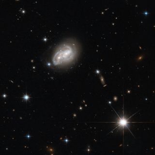 Merging Spiral Galaxies 2MASX J06094582-2140234