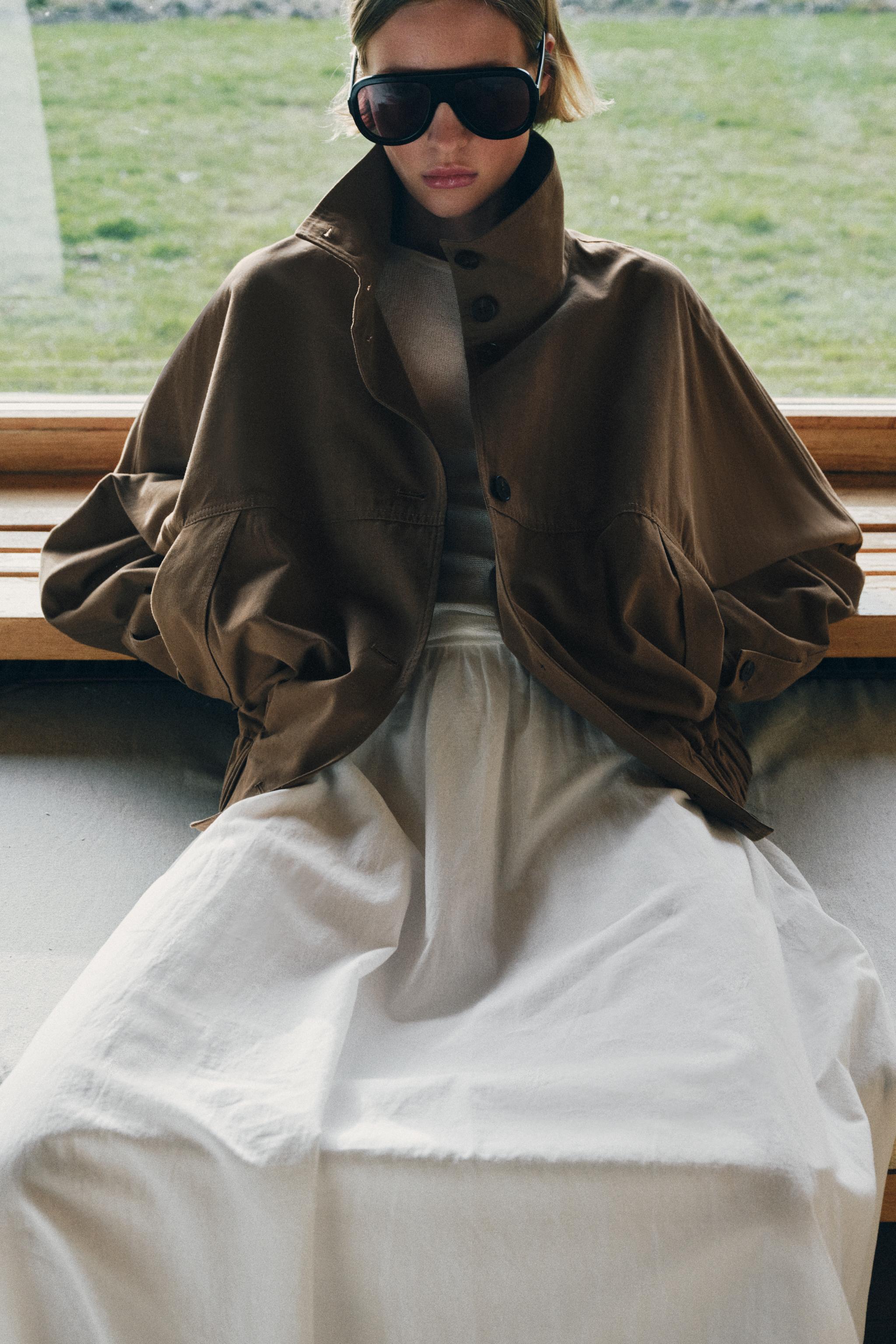 High Collar Jacket With Elastic Hem