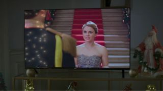 A Christmas Prince playing on Ashley's tv in The Merry Gentlemen