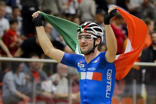 Italy's Elia Viviani celebrates after winning the Men's Omnium competition at the Track Elite European Championships