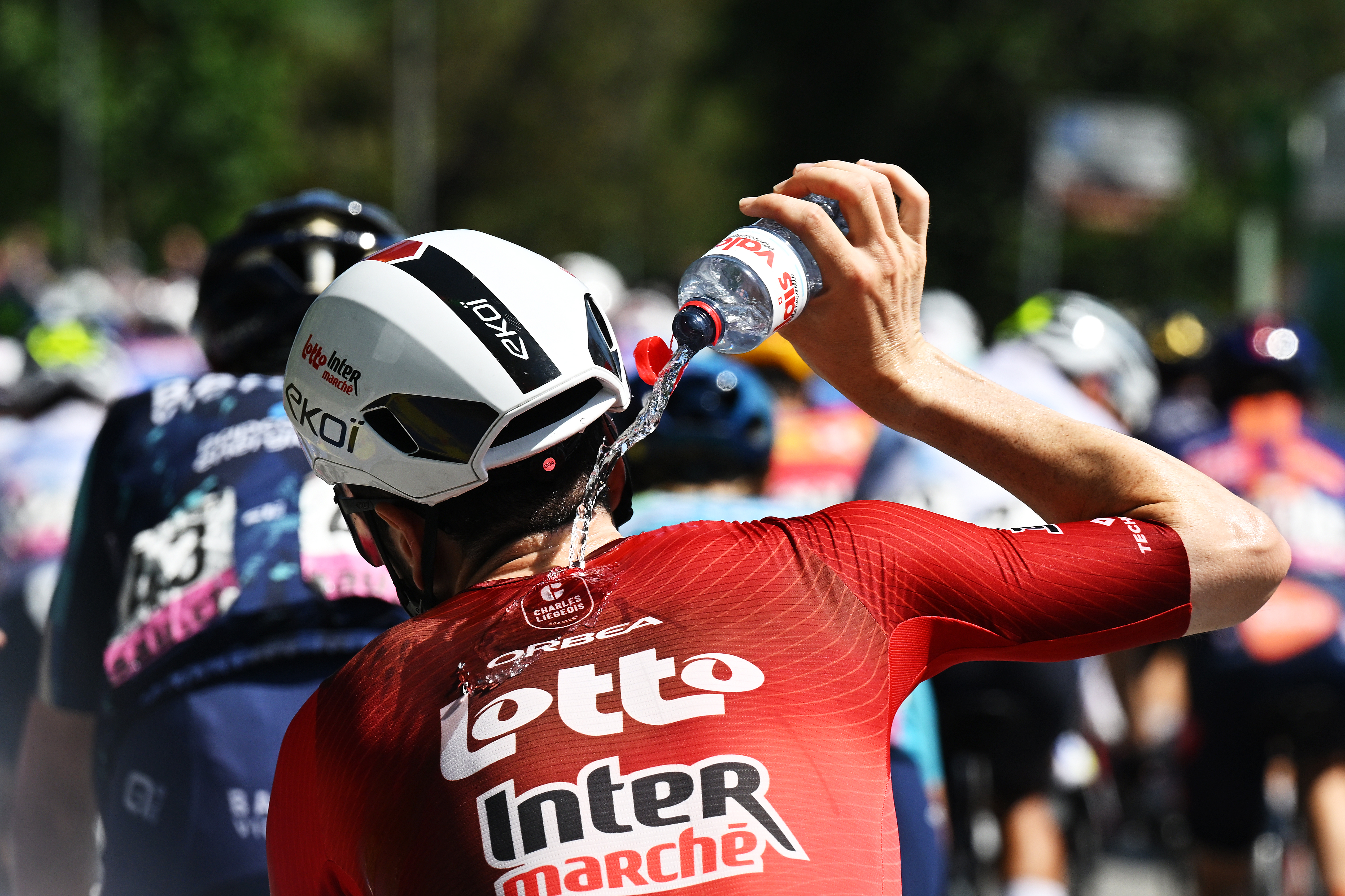 VILLARS-SUR-OLLON, SWITZERLAND - JUNE 21: Lorenzo Rota of Italy and Team Lotto Intermarche refreshes during the 89th Tour de Suisse 2026, Stage 5 a 150.7km stage from Villars-sur-Ollon to Villars-sur-Ollon 1249m / #UCIWT / on June 21, 2026 in Villars-sur-Ollon, Switzerland. (Photo by Tim de Waele/Getty Images)