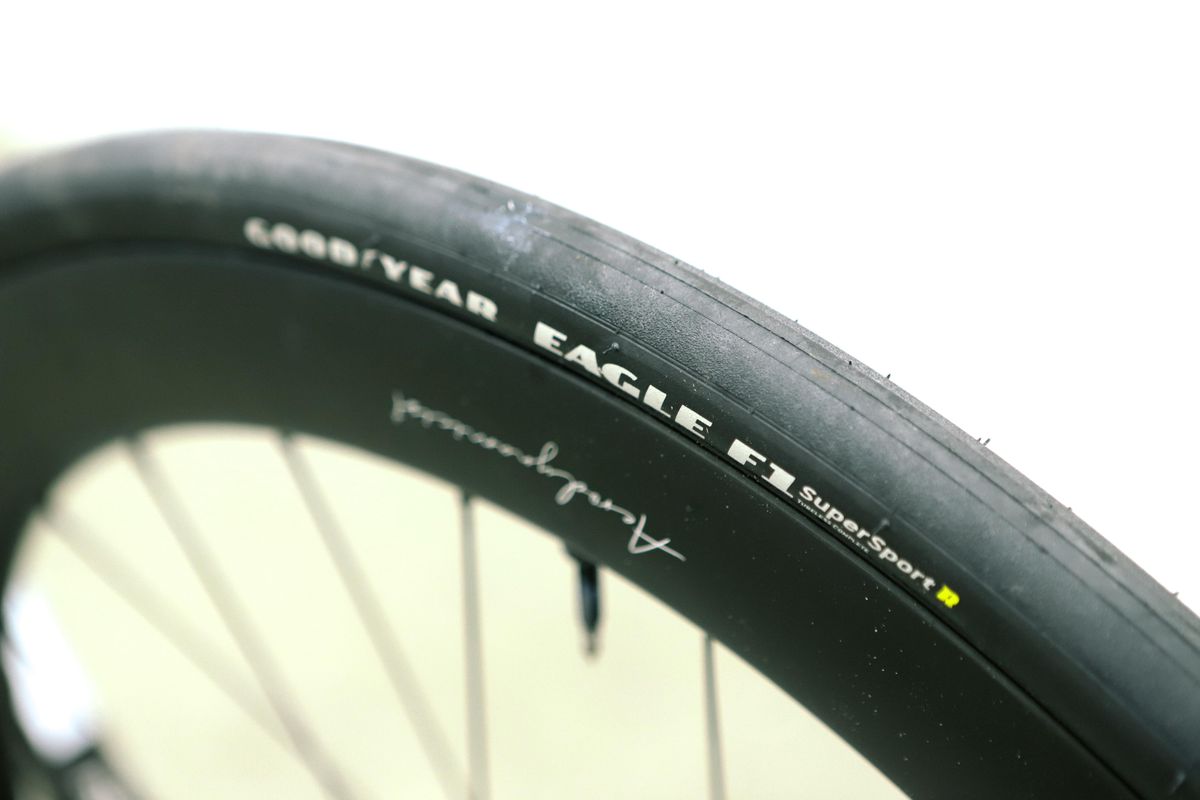 a close up of a black road bike tyre