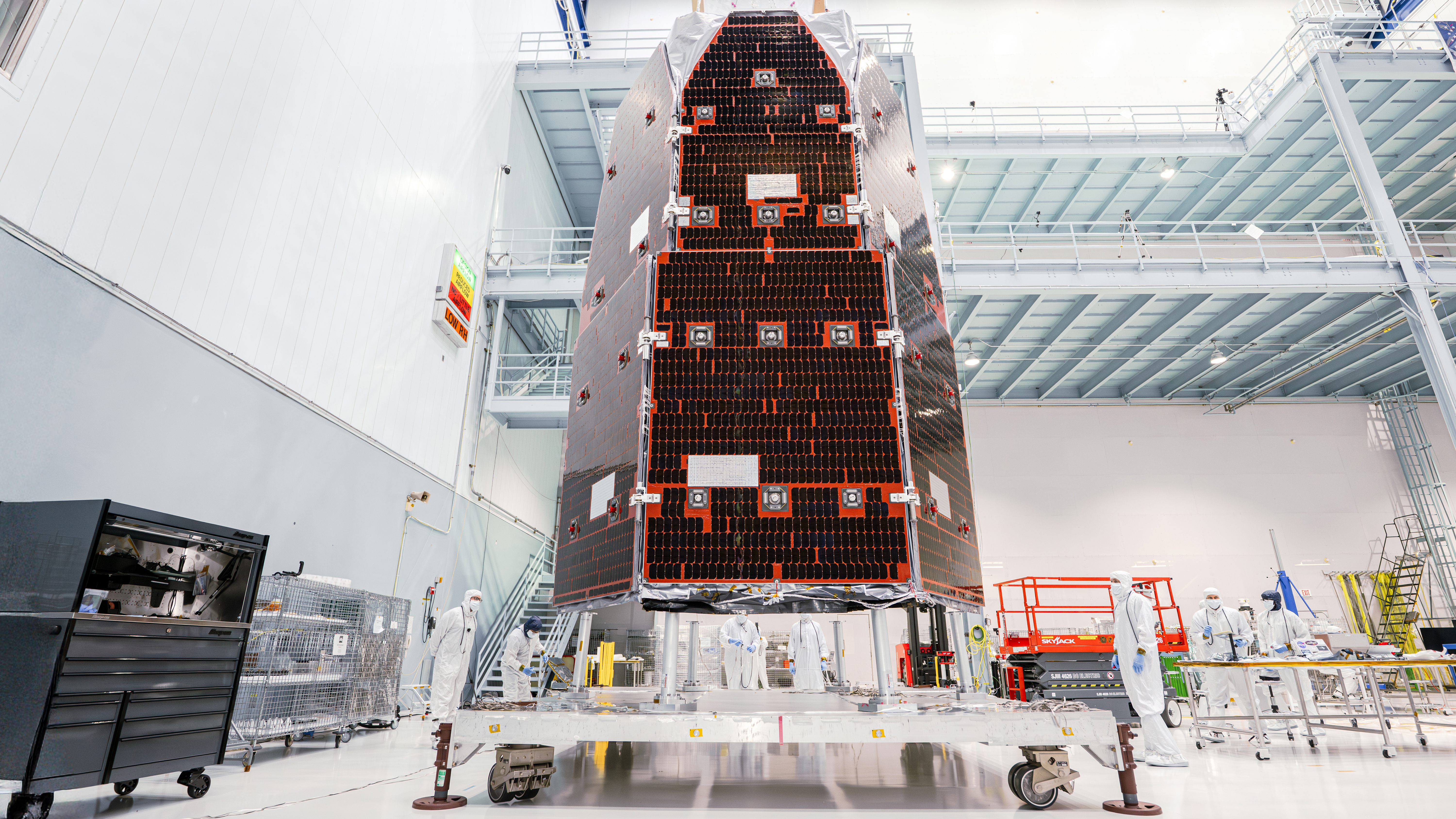 Workers finish assembling the Nancy Grace Roman Space Telescope in a clean room
