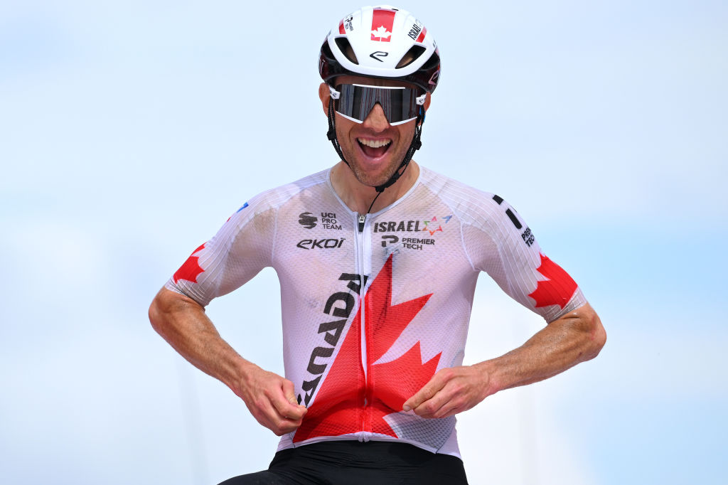 PUERTO DE ANCARES, SPAIN - AUGUST 30: Michael Woods of Canada and Team Israel - Premier Tech celebrates at finish line as stage winner during the La Vuelta - 79th Tour of Spain 2024 - Stage 13 a 176km stage from Lugo to Puerto de Ancares 1659m / #UCIWT / on August 30, 2024 in Puerto de Ancares, Spain. (Photo by Tim de Waele/Getty Images)