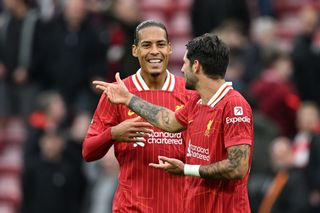 Liverpool squad for 2024/25 LIVERPOOL, ENGLAND - AUGUST 25: Dominik Szoboszlai of Liverpool interacts with Virgil van Dijk of Liverpool after the Premier League match between Liverpool FC and Brentford FC at Anfield on August 25, 2024 in Liverpool, England. (Photo by Michael Regan/Getty Images)