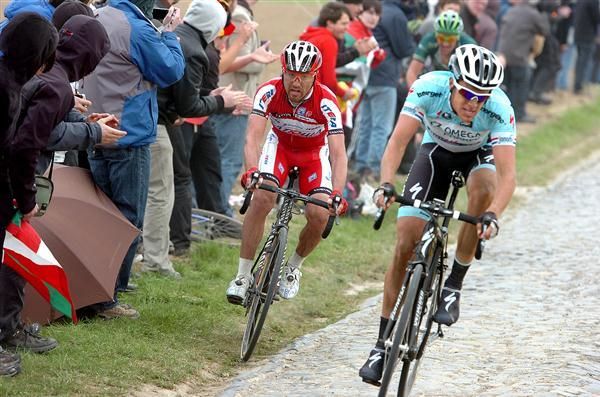 Luca Paolini (Katusha) is forced wide in pursuit of Niki Terpstra (Omega Pharma-QuickStep)