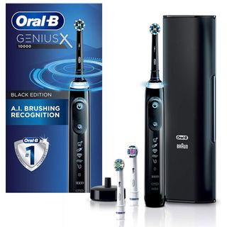 Oral-B genius x electric toothbrush brush heads and box on a white background