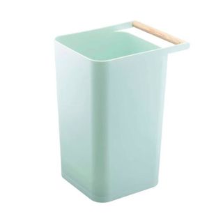 A blue plastic trash can with wooden handle