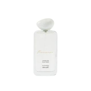 A 100ml glass M&S perfume bottle white a white shapely cap.