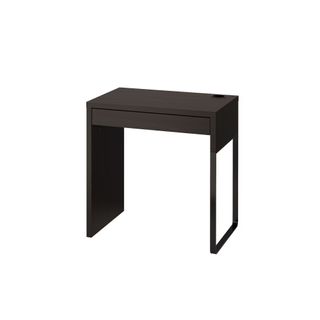 IKEA's modern Micke Desk in brown with drawer and space for wiring at the back