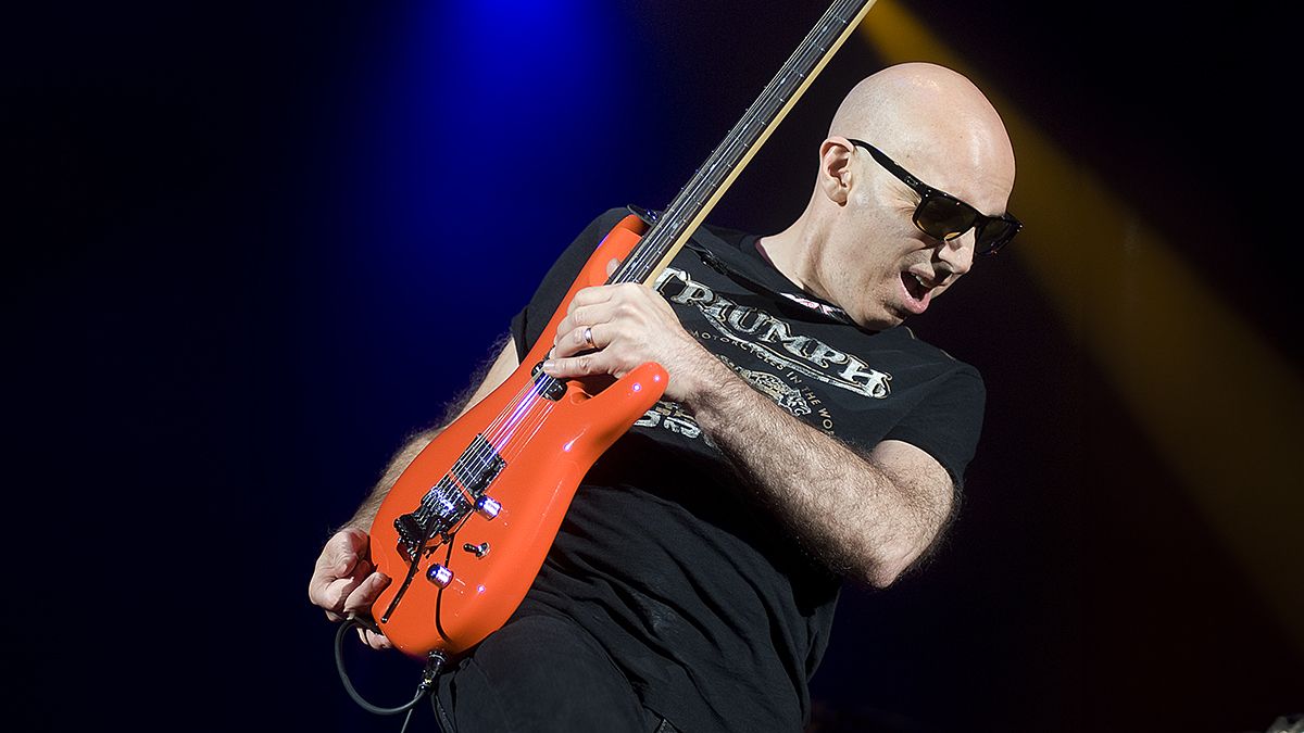 Joe Satriani playing his Ibanez signature guitar