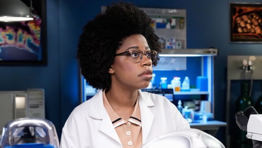 Diona Reasonover&#039;s Kasie Hines looking at her lab&#039;s computer in NCIS