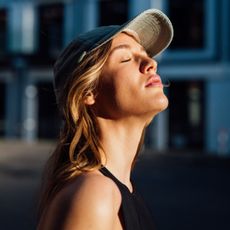 A woman using an AI run coaching app for her run training