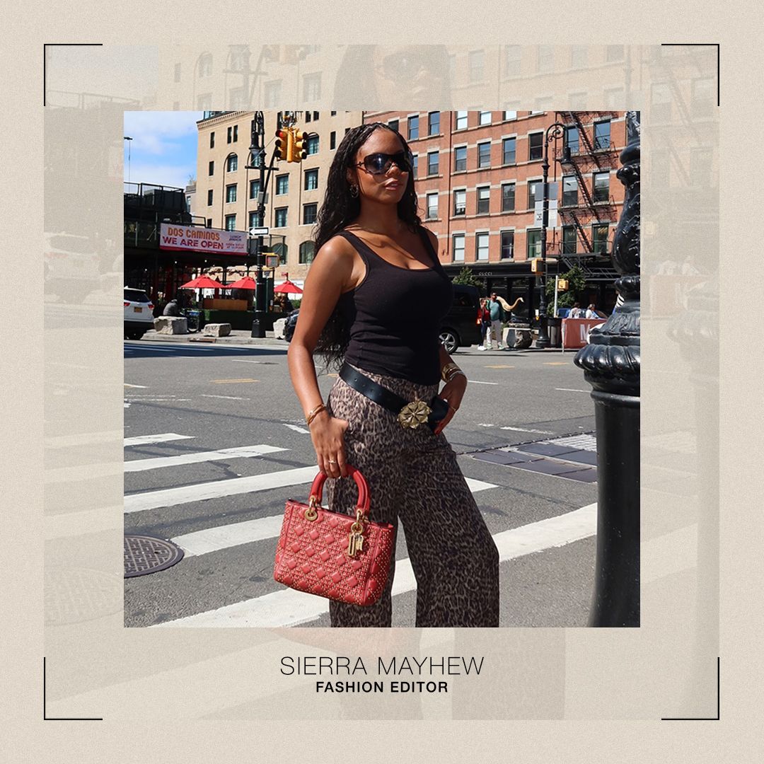 a photo of sierra with a red dior bag and cheetah pants.