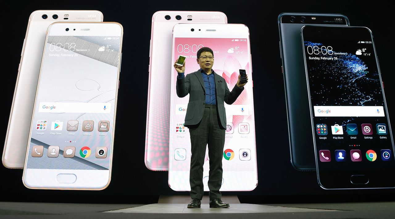 Chinese multinational networking and telecommunications equipment and services company Huawei&amp;#039;s CEO Richard Yu presents the new phone Huawei&amp;#039;s P10 during a press conference on February 26, 20