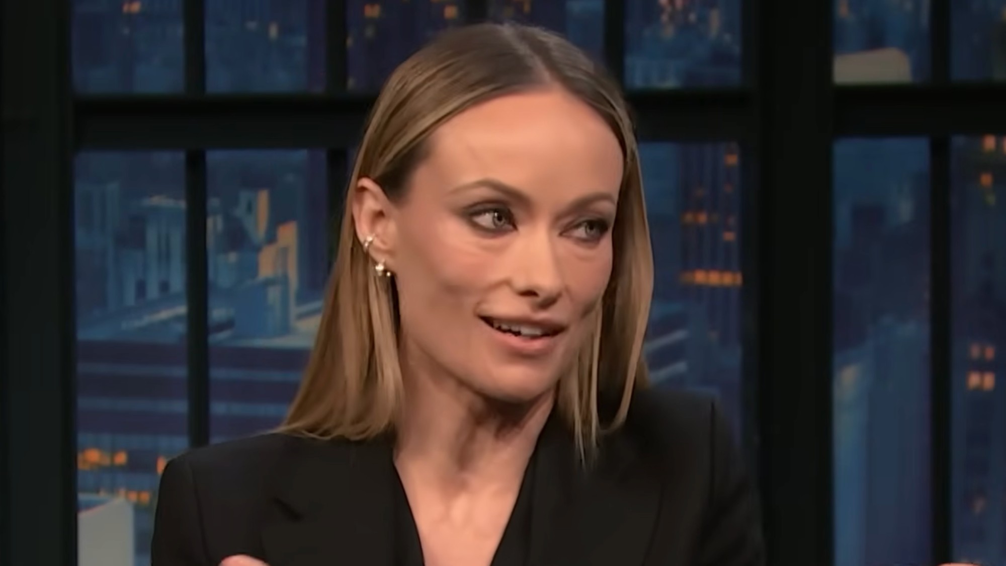 Olivia Wilde on television in an interview with Seth Meyers. 