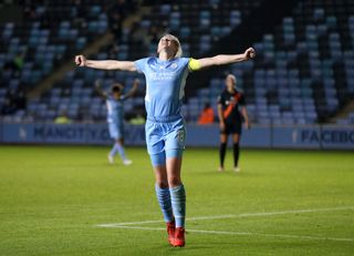 Ellen White of Manchester City celebrates after scoring her sides fifth goal during the FA Women's Continental Tyres League Cup match between Manchester City Women and Everton Women at Manchester City Football Academy on October 13, 2021 in Manchester, England.
