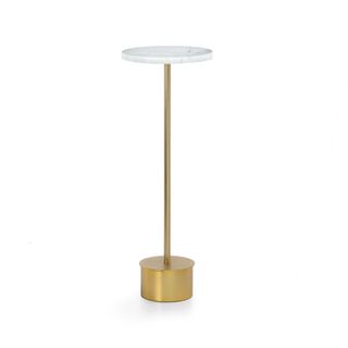 A gold end table with marble top
