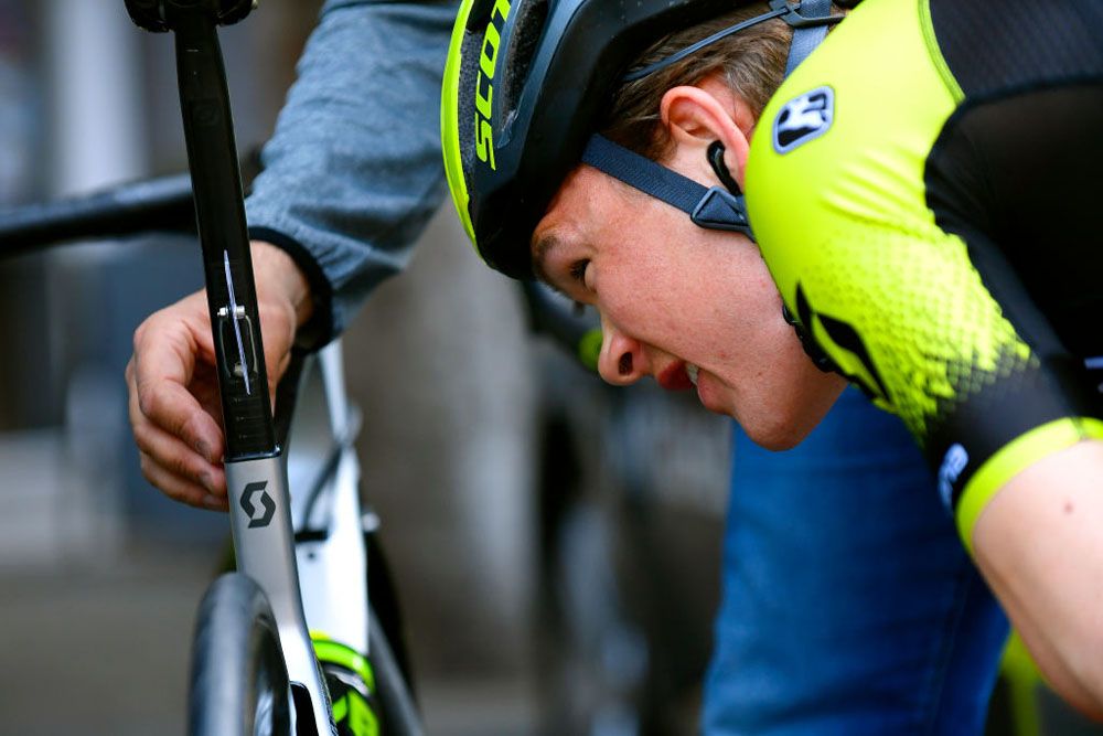 Christopher Juul Jensen checks over his bike