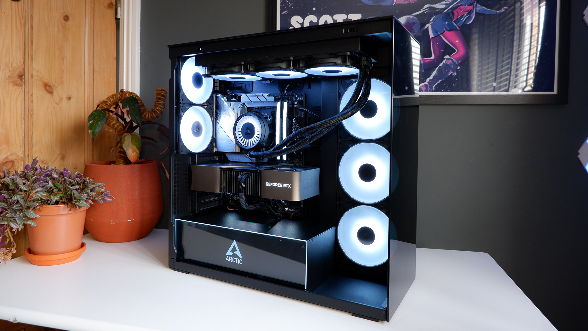 Arctic's Xtender PC case on a white desk with various parts being installed to build a functional gaming PC.