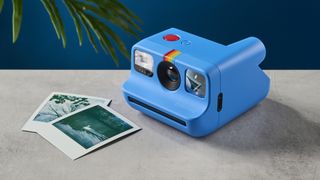 A blue Polaroid Go Gen 2 instant camera