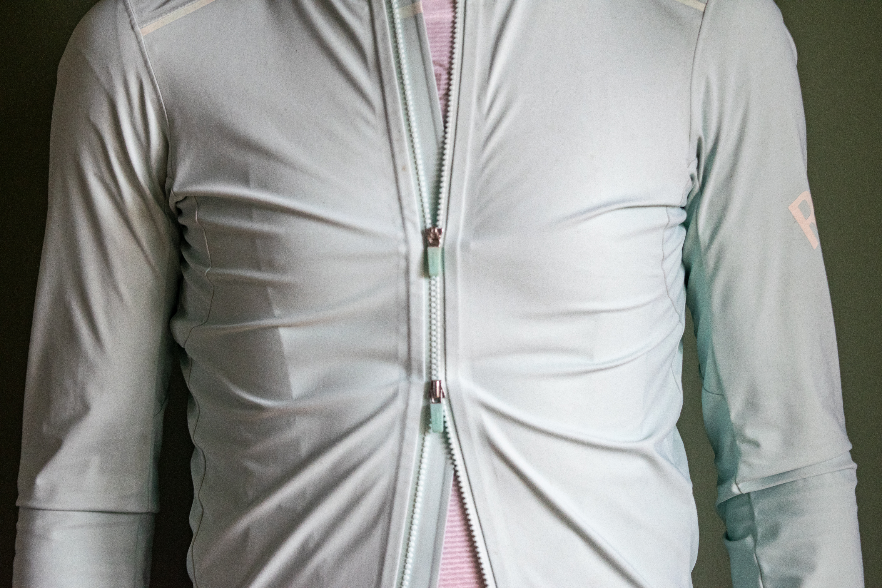 A man wearing a Rapha Shadow jersey