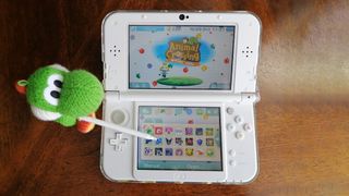 Nintendo 3ds With Sylus And Yoshi Amiibo