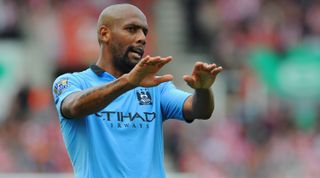STOKE ON TRENT, ENGLAND - SEPTEMBER 15: Maicon of Manchester City gestures during the Barclays Premier League match between Stoke City and Manchester City at the Britannia Stadium on September 15, 2012 in Stoke on Trent, England. (Photo by Michael Regan/Getty Images)