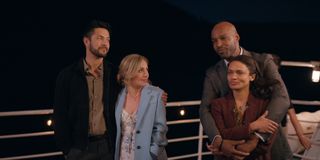 Marco Grazzini as Mike Valenzuela, Zibby Allen as Brie Sheridan, Colin Lawrence as Preacher, Kandyse McClure as Kaia as they stand on a balcony in virgin river