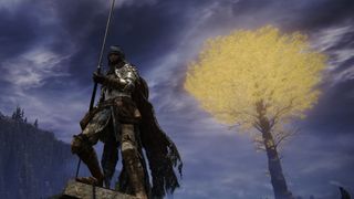 A warrior stands against a blue sky