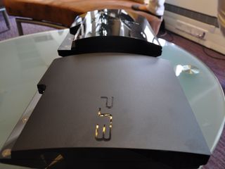 PS3 Slim next to PS3 'Phat'