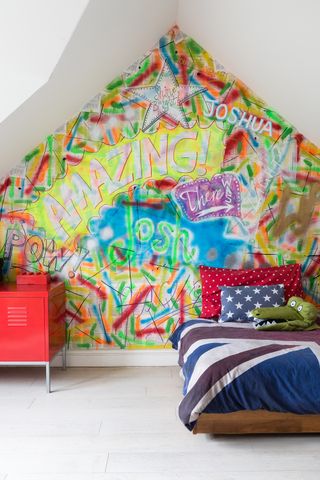 Kid's bedroom with colourful graffiti wall
