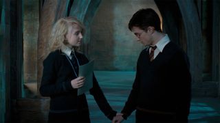 Luna holds Harry's hand as she tells him she is sorry about Sirius Black in Harry Potter and the Order of the Phoenix.