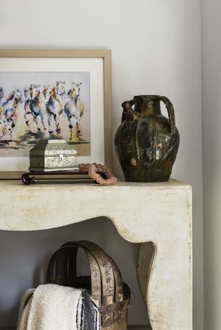 mantlepiece with art and objects