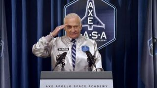 Buzz Aldrin salutes the camera in this still from a promotional video for the AXE Space Academy, a contest that aims to launch 22 winners on suborbital flights aboard XCOR Aerospace's Lynx spacecraft.
