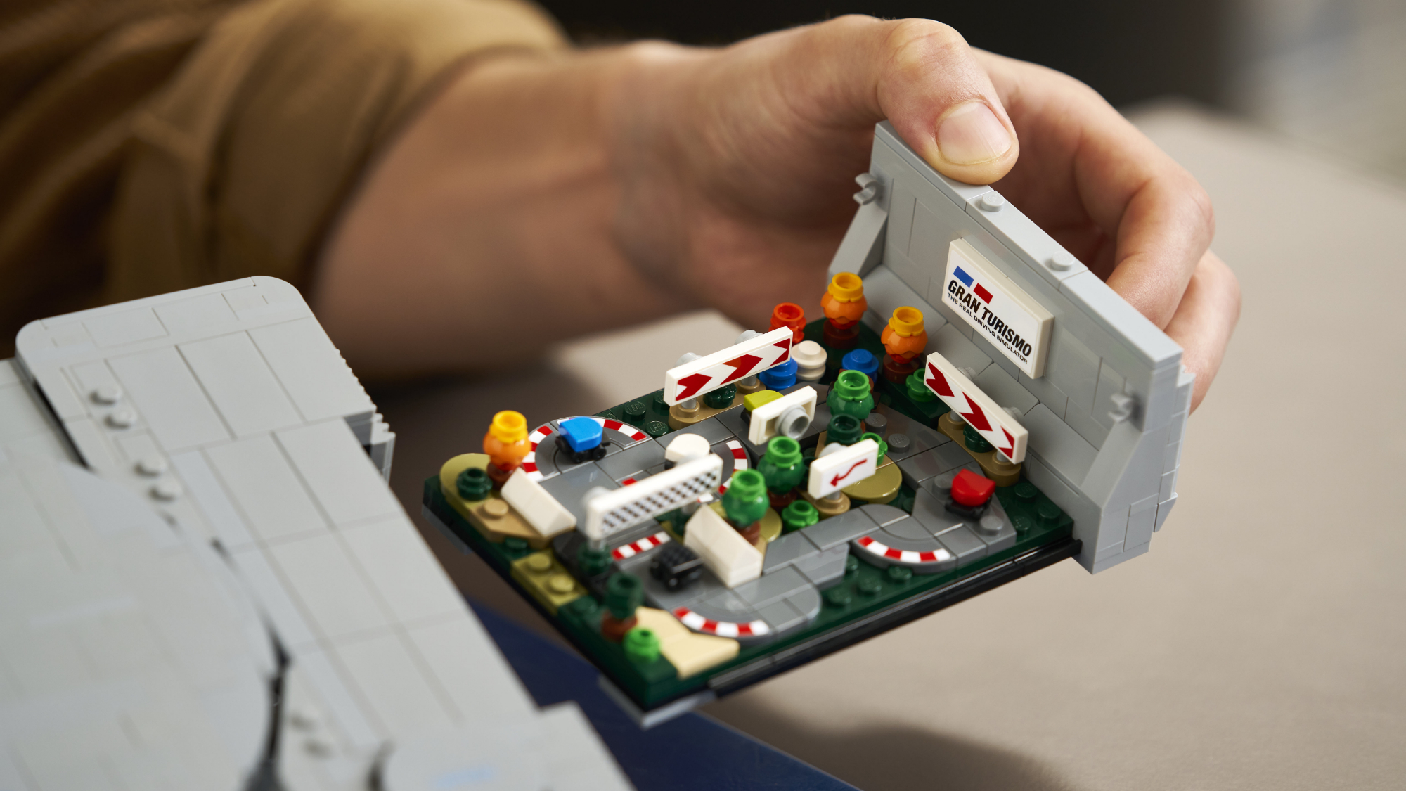 The inside of the Lego PlayStation showing the Gran Turismo diorama