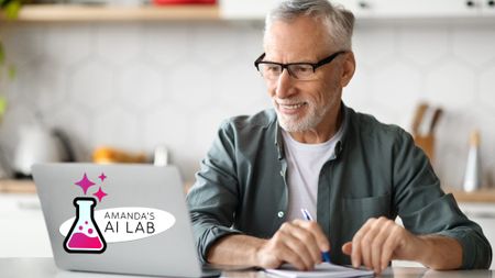 Older man on laptop with Amanda's AI Lab logo