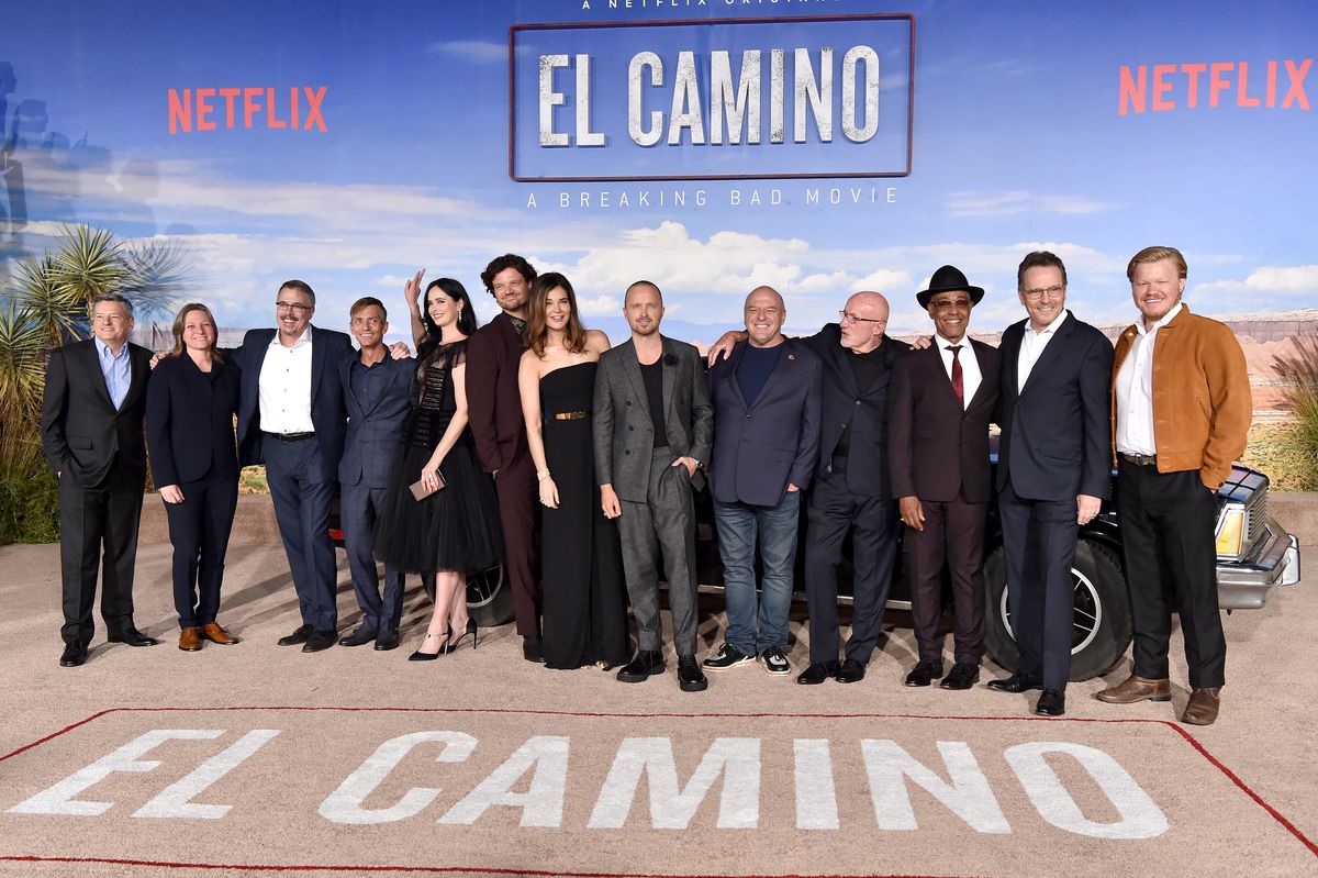 WESTWOOD, CALIFORNIA - OCTOBER 07: Ted Sarandos, Cindy Holland, Vince Gilligan, Charles Baker, Krysten Ritter, Matt Jones, Betsy Brandt, Aaron Paul, Dean Norris, Jonathan Banks, Giancarlo Esposito, Bryan Cranston, and Jesse Plemons attend the Premiere of Netflix&#039;s &quot;El Camino: A Breaking Bad Movie&quot; at Regency Village Theatre on October 07, 2019 in Westwood, California.