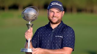 Jordan Smith with the Portugal Masters trophy