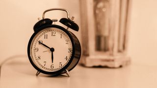 alarm clock on a bedside table