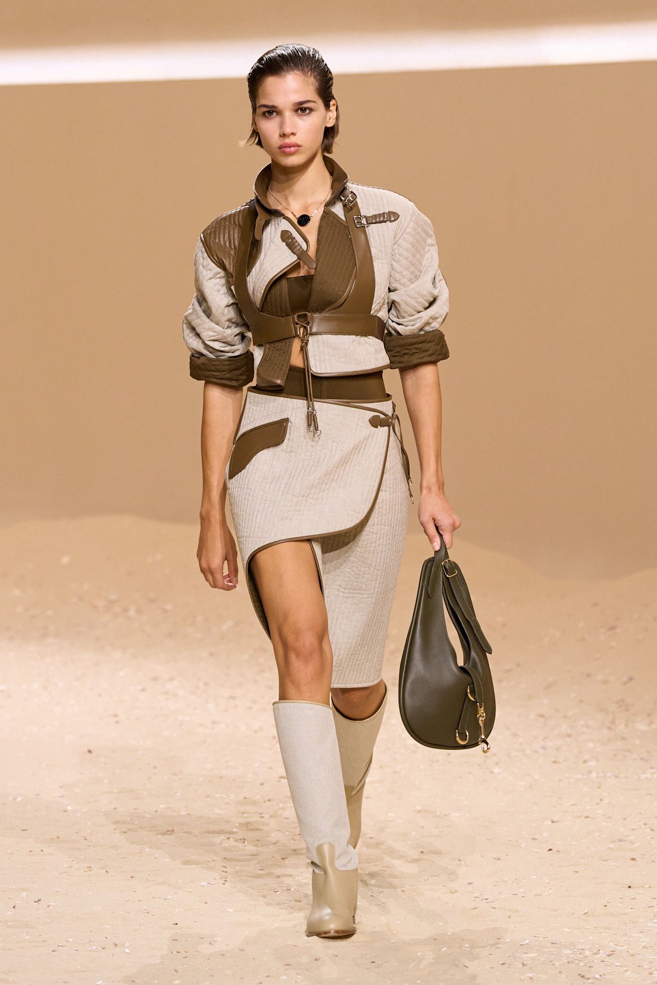 A model walks the Hermès spring 2026 runway show in paris.
