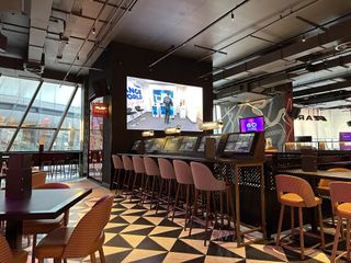 The sports bar with vivid displays at the F1 Arcade.