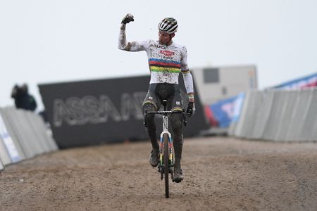 Dutch Mathieu Van Der Poel celebrates as he crosses the finish line to win the mens elite race of the Vestingcross cyclocross cycling event stage 4 of 5 of the World Cup competition in Hulst The Netherlands on January 3 2021 Photo by DAVID STOCKMAN BELGA AFP Belgium OUT Photo by DAVID STOCKMANBELGAAFP via Getty Images