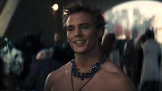 Sam Claflin as shirtless Finnick Odair meeting Katniss in Hunger Games: Catching Fire